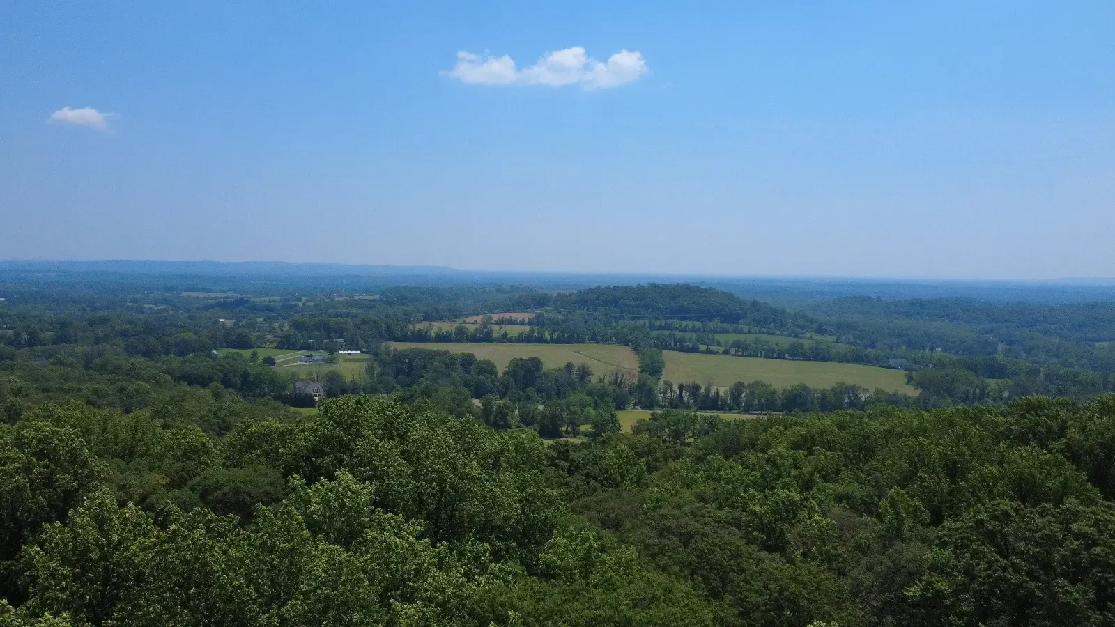 Aerial view over wooded hills and farmland in northwest New Jersey